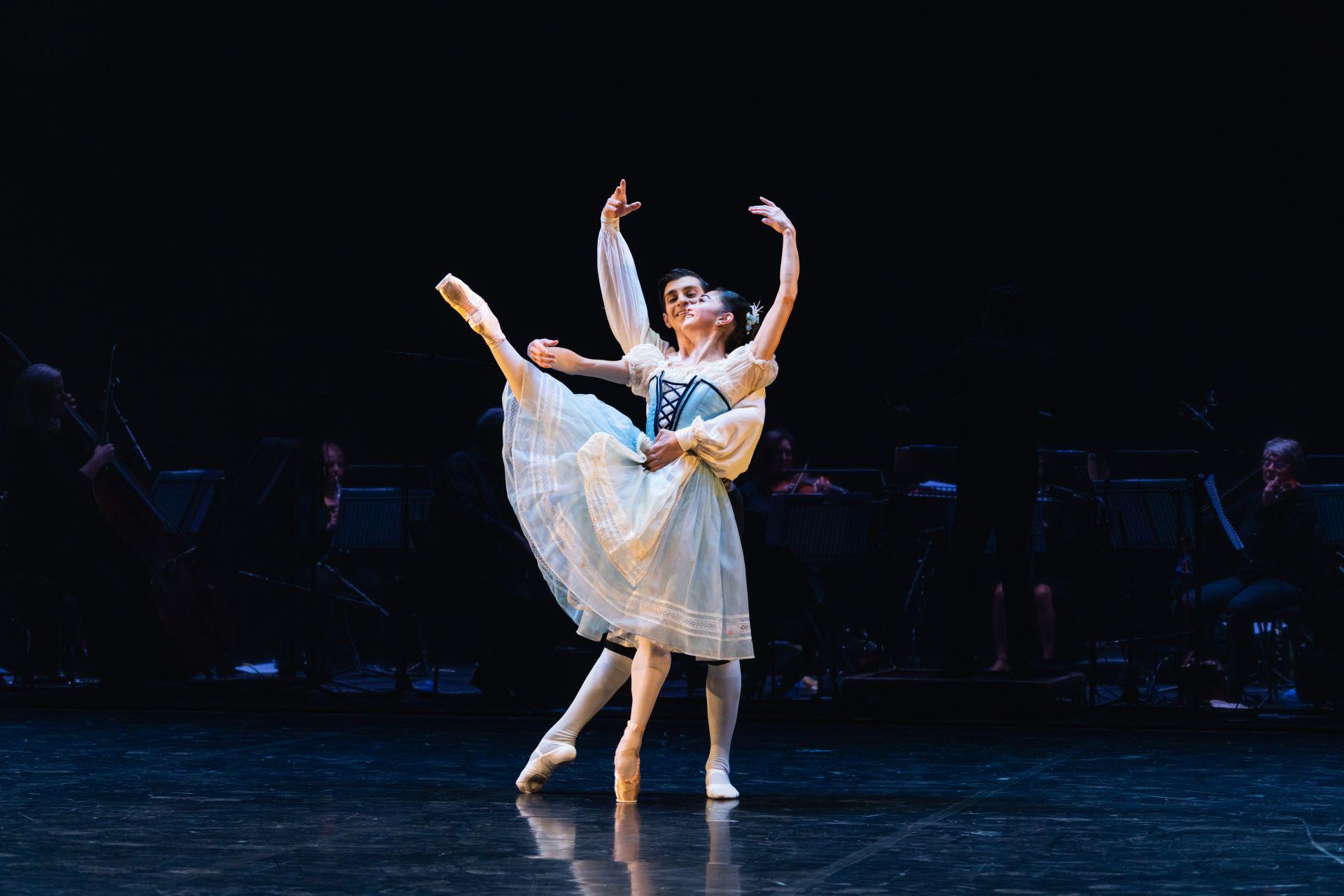 Two dancer embrace
